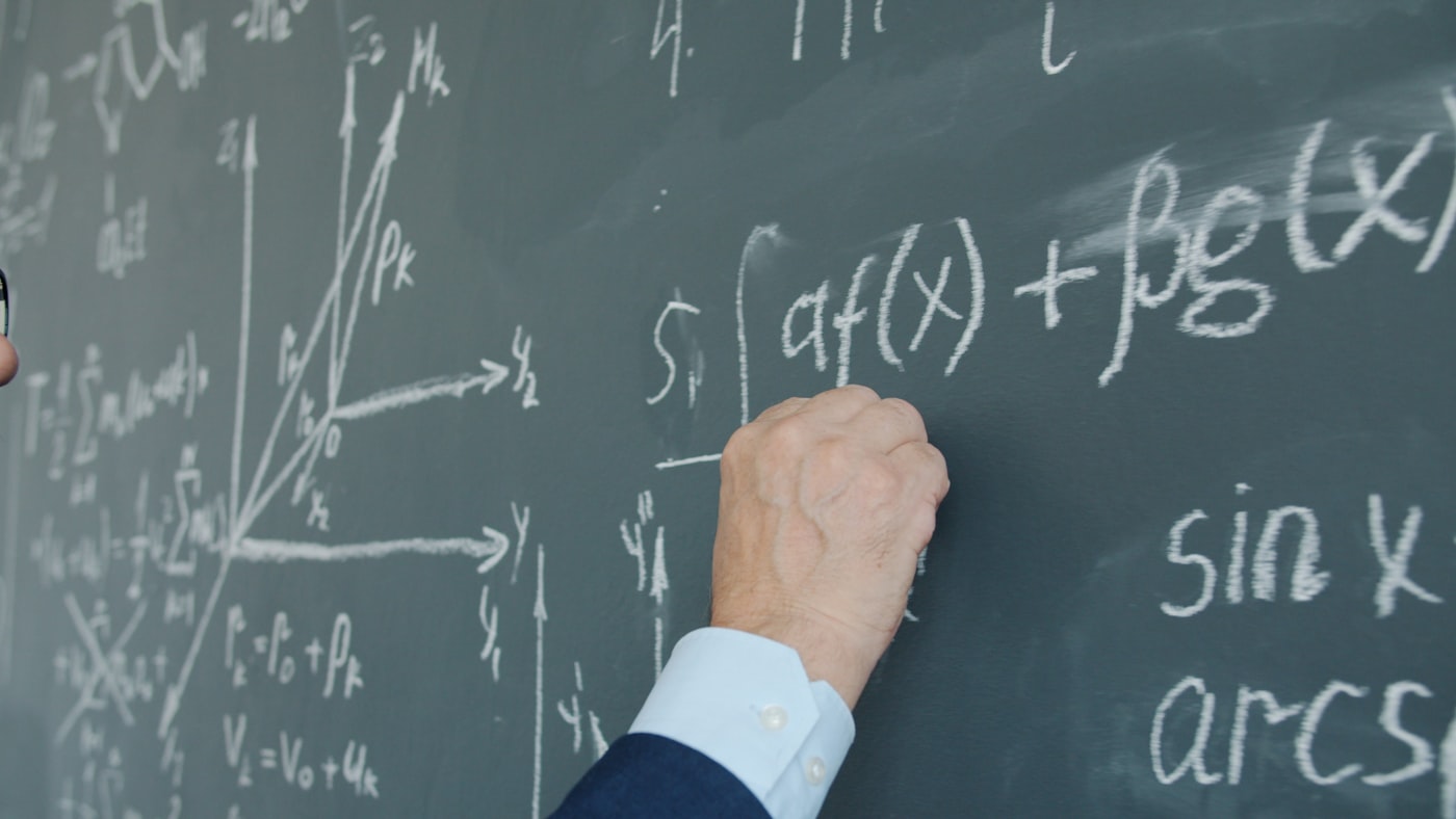 Mathematical formulas on a blackboard